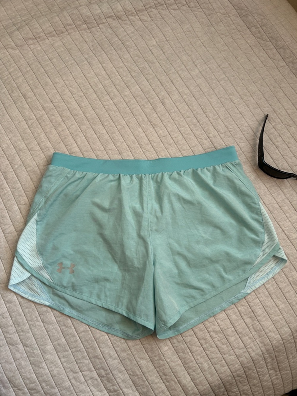 Under Armour loose heatgear running brief light blue pull on shorts M women’s